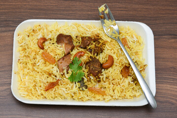 beef or Mutton or lamb biryani. Spicy Indian Malabar biryani or Hydrabadi biryani, Dum Biriyani, ...