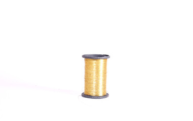 Golden thread in an isolated background