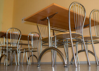 school kitchen canteen, metal table and chair legs, canteen equipment, tables and chairs