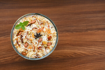 Veg biryani. Spicy Indian Malabar biryani or Hydrabadi biryani, Dum Biriyani,  pulao, pulav, pilaf, basmati rice, spicy mixed rice dish with meat curry for Ramadan Kareem, Eid