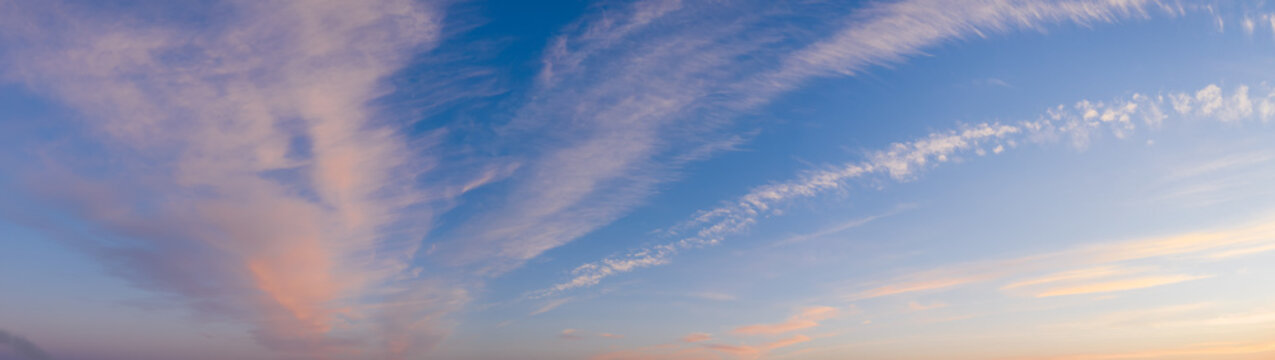 Colorful sky with cirrus clouds during dawn. High resolution panorama. View from drone