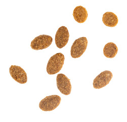 Food for animals isolated white background. Dry cat and dog food texture. Pet meal background close up