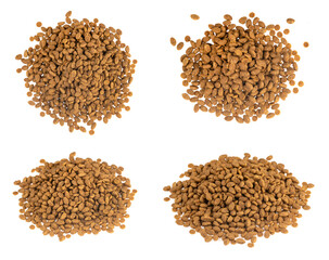 Food for animals isolated white background. Dry cat and dog food texture. Pet meal background close up