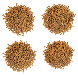 Food for animals isolated white background. Dry cat and dog food texture. Pet meal background close up