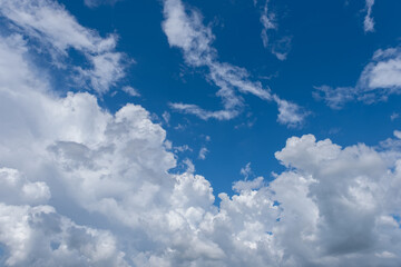 Naklejka na ściany i meble background of blue sky with clouds in the day