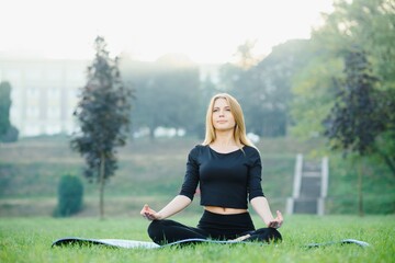 yoga woman on green park