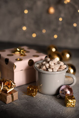 Mug for mockup near christmas tree and gift boxes.