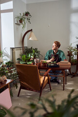 Fototapeta premium Florist taking care about cactuses