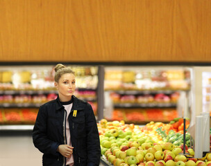 Woman buying fruits at the market