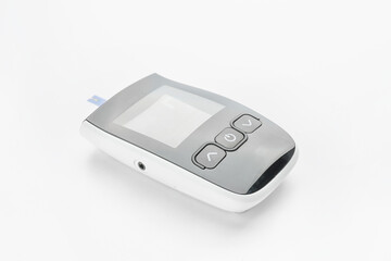 Glucometer on white background. Diabetes concept