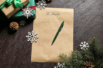 Letter to Santa and Christmas decor on dark background