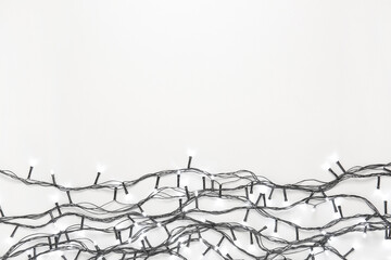 Christmas lights on white background