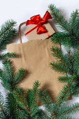 branch fur pine evergreen gift red bag package white christmas tree background