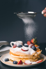 Sweet Homemade Stack of Pancakes with Butter and Syrup for Breakfast
