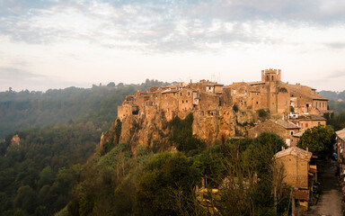 Obraz premium Dawn over the medieval commune town of Calcata in Italy depopulated in 1930th for fear of collapse and then repopulated by artists and hippies in 1960