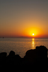 Stunning sunset over the Aegean sea in Greece
