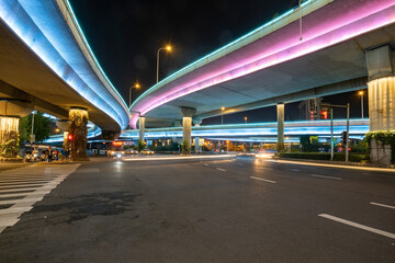 Fototapeta na wymiar Flyovers and expressways glowing at night in Nanjing, China