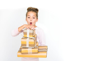 Excited surprised young girl in red dress and santa hat with gift box isolated on white background, banner copy space. Christmas congratulation concept.