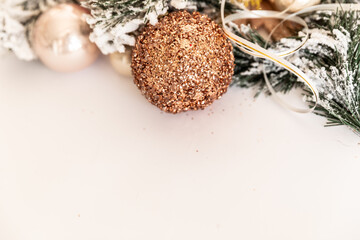 Golden Christmas tree New Year's toys on a white