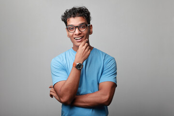 Portrait of an excited young man of Indian origin