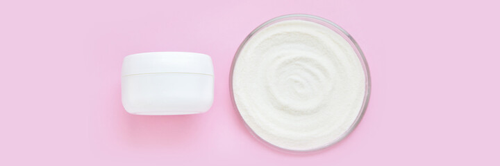 Collagen white powder. Pastel color background. Health product. Woman cosmetics concept. Sport supplement. Skincare cosmetics. Horizontal banner. Pink monochrome. Cream jar. Cream jar