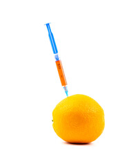 Syringe with orange injection on white background