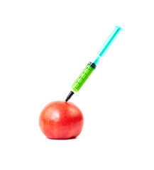 Injection of a medical syringe with liquid stuck in a fresh tomato. Isolated. White background