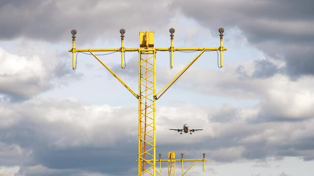 Airliner on final approach. View from the runway