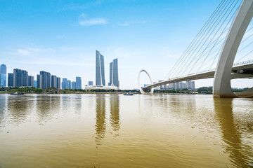 Eye of Nanjing Pedestrian Bridge and urban skyline in Nanjing, China