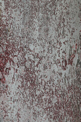 Old wooden door For more than eighty years in the sun and for a long time it is deteriorating with time and the color is peeling off the wood.