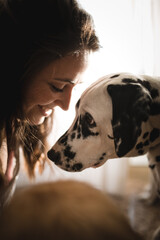 Girl playing with dogs