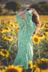 Girls in sunflower field