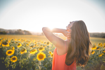 Girls in sunflower field