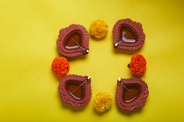 happy diwali or happy deepavali greeting card made using a photograph of diya or oil lamp