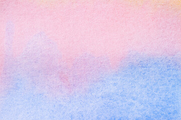 Aquarelle paper canvas painted into pink and blue colors