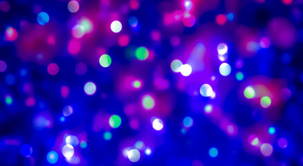 Sparkling colorful little circle on blurred background