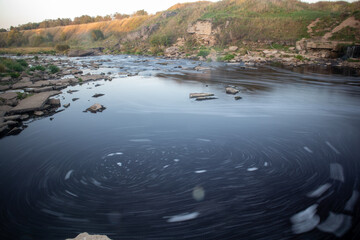 A photo of a small river in Russia, taken on a long exposure.