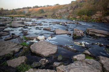 A photo of a small river in Russia, taken on a long exposure.