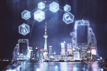 Double exposure of technology theme hologram and cityscape background. Concept of Hightech.