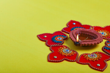 happy diwali or happy deepavali greeting card made using a photograph of diya or oil lamp