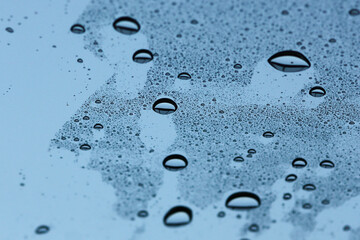 A Beautiful drops on glass background