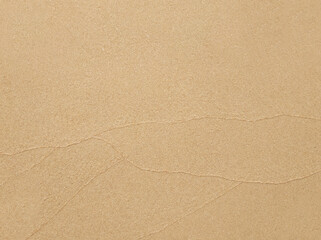 Beige sand texture background with thin lines
