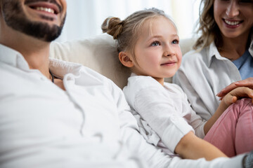 Fototapeta premium Girl attentively watching movie