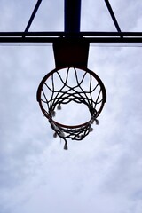 basketball hoop silhouette and blue sky, street basket in Bilbao city Spain