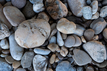 Stones on the beach Danube river Bratislava, Decorative stone wallpaper with nature texture