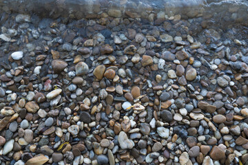 Stones on the beach Danube river Bratislava, Decorative stone wallpaper with nature texture