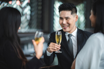 Business people relax from work in bar, Taking a break from business with beer and wine