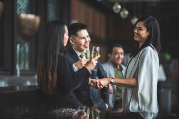 Business people relax from work in bar, Taking a break from business with beer and wine