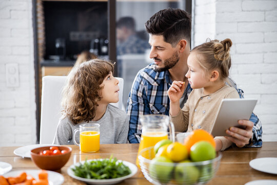 Father and son looking to each other