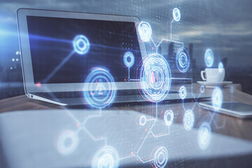 Double exposure of computer and technology theme hologram. Concept of freelance work.